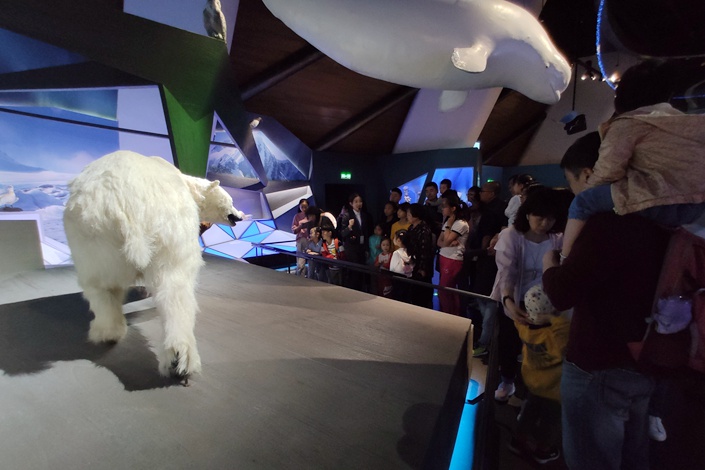 Families visit the National Maritime Museum in Tianjin on May 1. Photo: Wu Gang/Caixin
