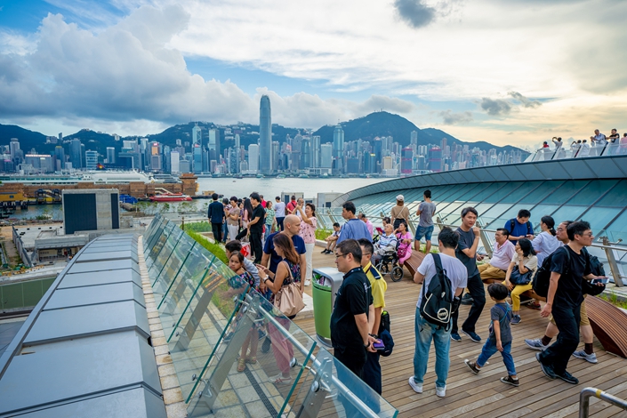 People view Hong Kong's Victoria Harbor from a sightseeing platform at West Kowloon railway station in Hong Kong, on Sept. 23. Photo: IC Photo