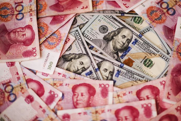 The Chinese currency has plummeted 3.9% this month against the dollar, the biggest loss since January 1994. Photo: Bloomberg