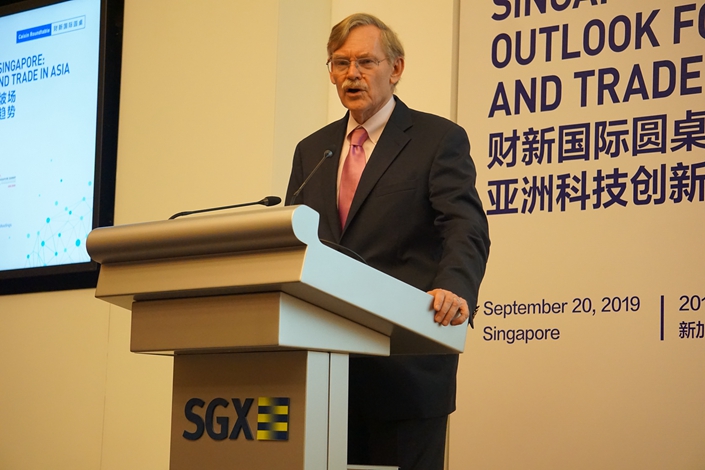 Robert Zoellick, a former president of the World Bank, speaks at Caixin Roundtable Singapore on Sept. 20. Photo: Caixin