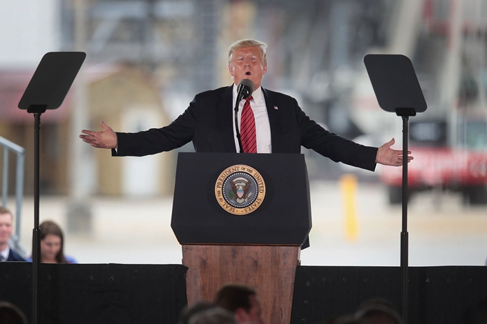 President Donald Trump speaks to guests during a visit to the Southeast Iowa Renewable Energy ethanol facility on June 11 in Council Bluffs, Iowa, U.S. Photo: VCG