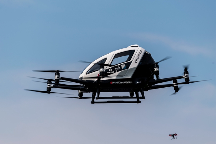 An Ehang 216 air taxi, the creation of Chinese drone manufacturer Ehang, makes a test flight on April 4 at a soccer stadium in Vienna, Austria. Photo: IC Photo