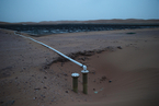 腾格里沙漠再现非法排污 已清理出4.2万吨污染物