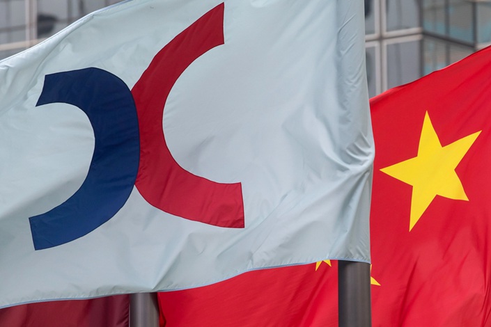 The flag of the Stock Exchange of Hong Kong is seen at the Central district in Hong Kong. Photo: Bloomberg