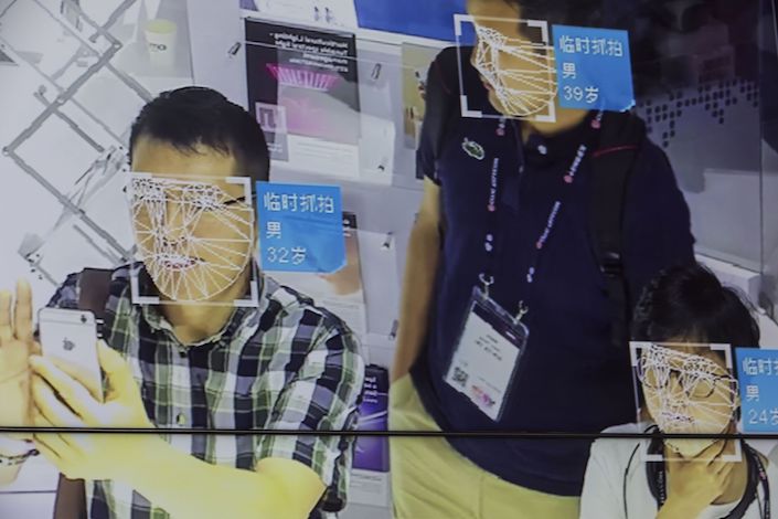 A screen shows facial recognition features of visitors at a Megvii Technologies Ltd booth at the Mobile World Congress in Shanghai. Photo: Bloomberg