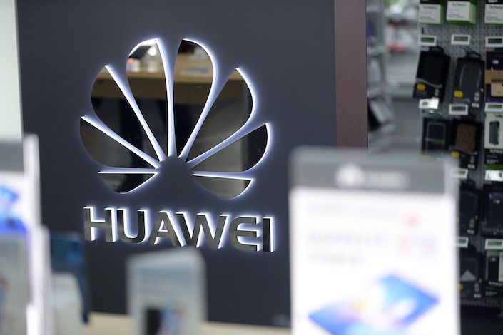 A Huawei logo sits on display inside a Media Markt electronic goods store in Germany. Photo: Bloomberg