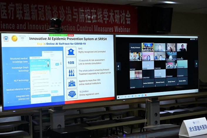 Members of multinational medical institutions participate in a video conference held by a hospital affiliated with the Zhejiang University School of Medicine on March 27. Photo: People.vcg