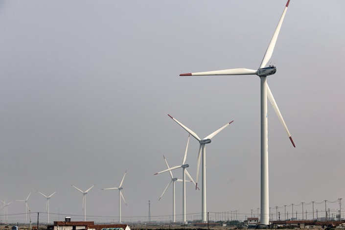 Wind turbines stand at a wind farm operated by China Huaneng Group in Qidong. Photo: Bloomberg
