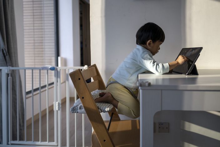 A child takes online class at home. Photo: Bloomberg