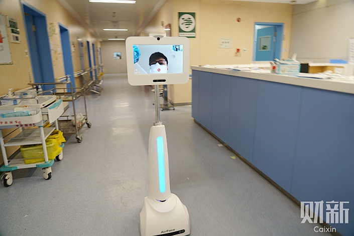 A telemedicine robot in Shanghai's Ruijin Hospital on Feb. 22. Photo: Caixin