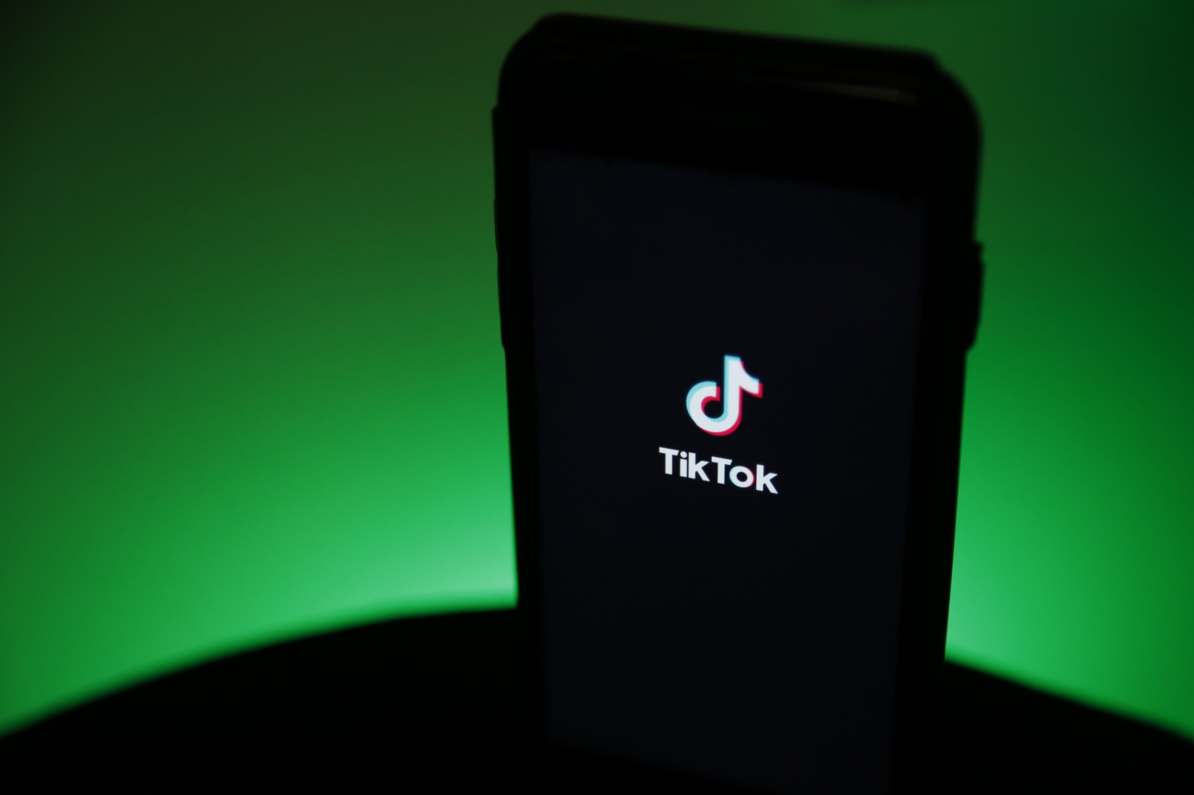 The TikTok logo is displayed on a smartphone in this arranged photograph in London. Photo: Bloomberg