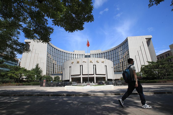 The People’s Bank of China and other financial regulators have issued draft rules that will subject Chinese companies that operate financial institutions to tighter requirements in an effort to curb financial risks.