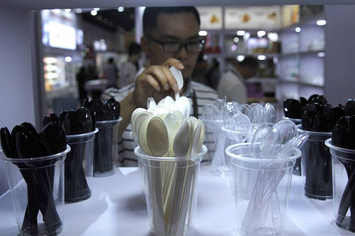 Plastic tableware on display at a trade show in Beijing on July 2, 2019.
