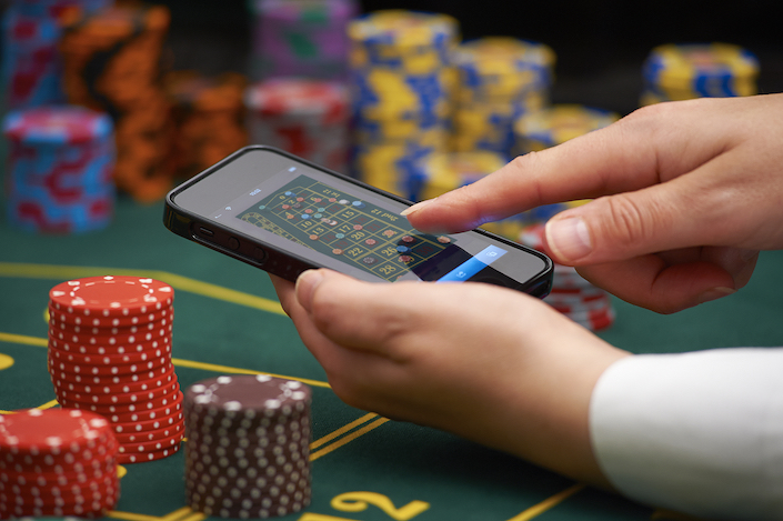 CX Daily: How China's E-Commerce Giants Enable Illegal Online Gambling - Caixin Global