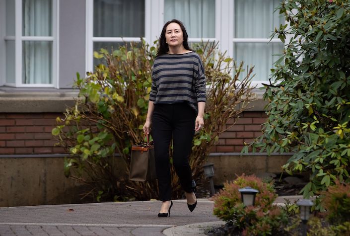 Meng Wanzhou leaves her home to attend Supreme Court for a hearing in Vancouver