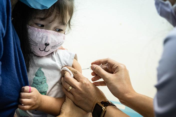 A child receives an influenza vaccine shot at a clinic in Hong Kong on Nov. 17, 2020. Photo: VCG