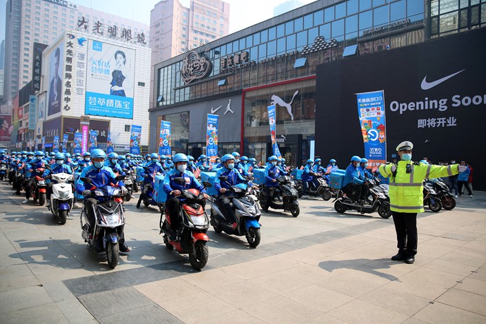 In their pledges, the companies vowed to follow Chinese laws and foster a healthy market environment built around fair competition. Photo: VCG