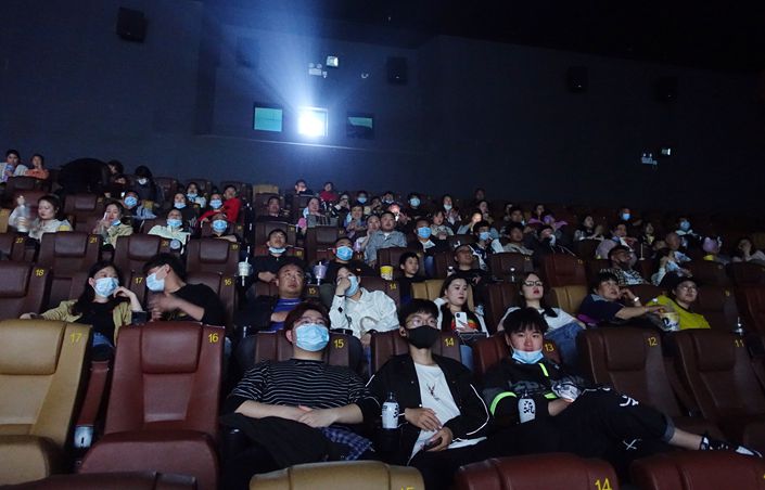 Movie goers take in a film Sunday at a cinema in Fuyang, East China's Anhui Province. Photo: VCG