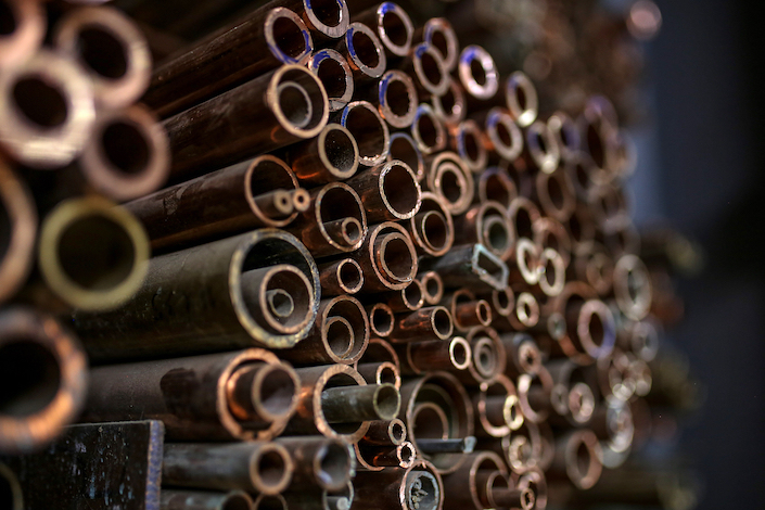 Copper pipes at a wholesale metal dealer in Mumbai.