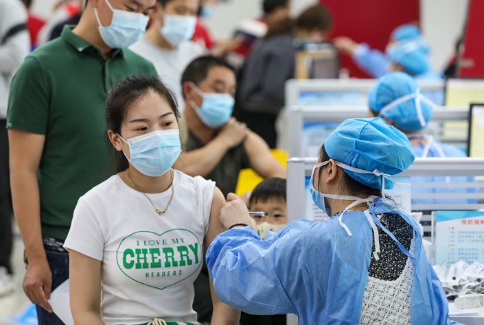 China Hands Out 100 Million Covid Vaccine Doses in Eight Days - Caixin Global
