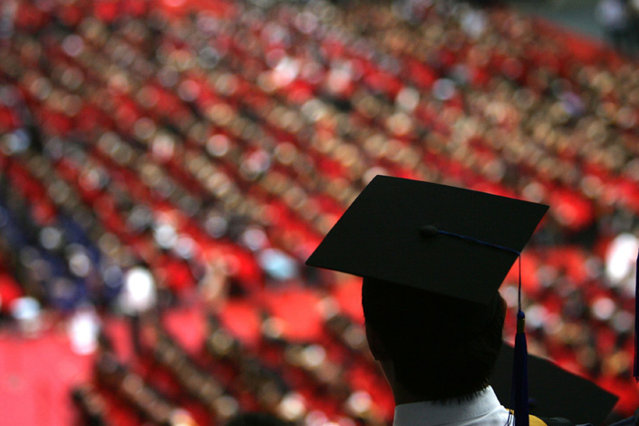 Students graduate during a ceremony at Tsinghua University on July 18, 2007, in Beijing. Photo: Bloomberg
