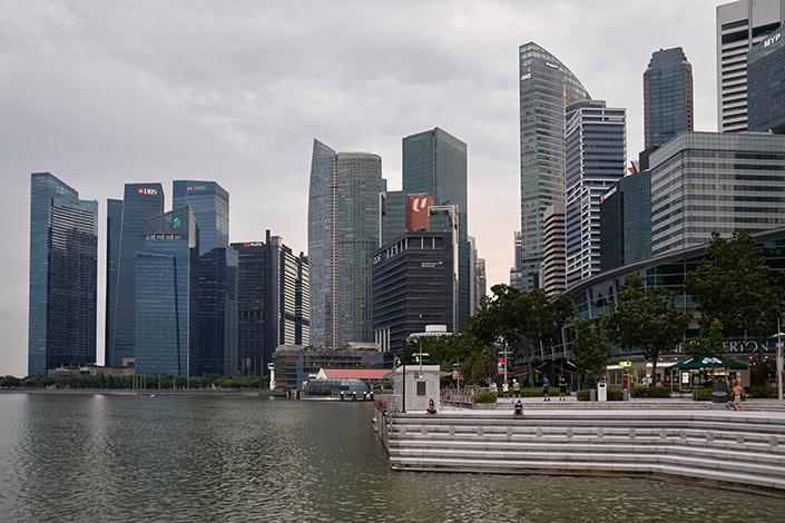 Commercial real estate in the central business district beyond Merlion Park of Singapore, on May 19. Photo: Bloomberg