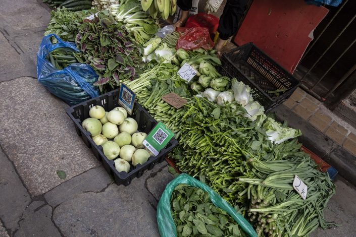 Vegetables laid out for sale at an open-air market in Guangzhou, on May 24. Photo: Bloomberg