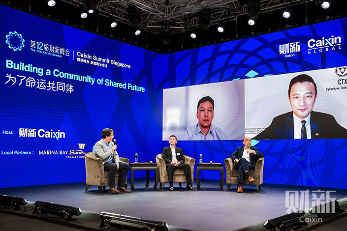 Panelists talk about Asia's sustainability challenges with moderator Julien Mialaret, operating partner of Eurazeo, on Friday at the summit's Singapore venue. Photo: Alex Chen
