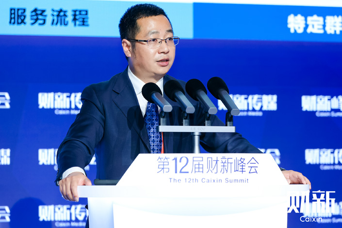 Wei Dong, vice president and chief safety operation officer of Baidu Intelligent Driving Group, speaks at a panel discussion on the 12th Caixin Summit in Beijing on Friday. Photo: Caixin 