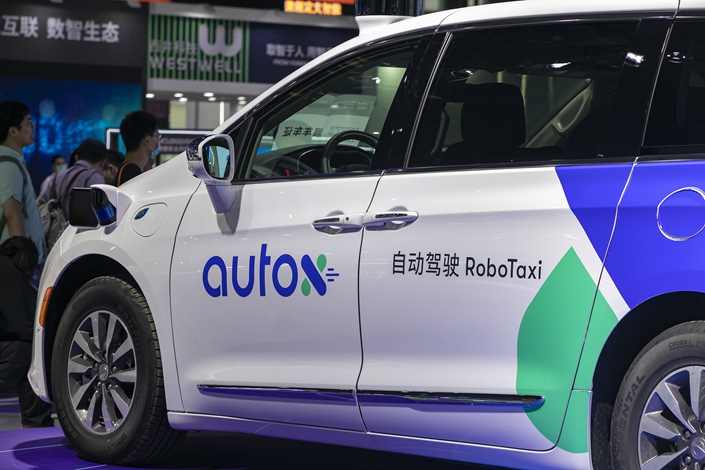 A robotaxi sits on display at the World Artificial Intelligence Conference in Shanghai on July 9. Photo: VCG