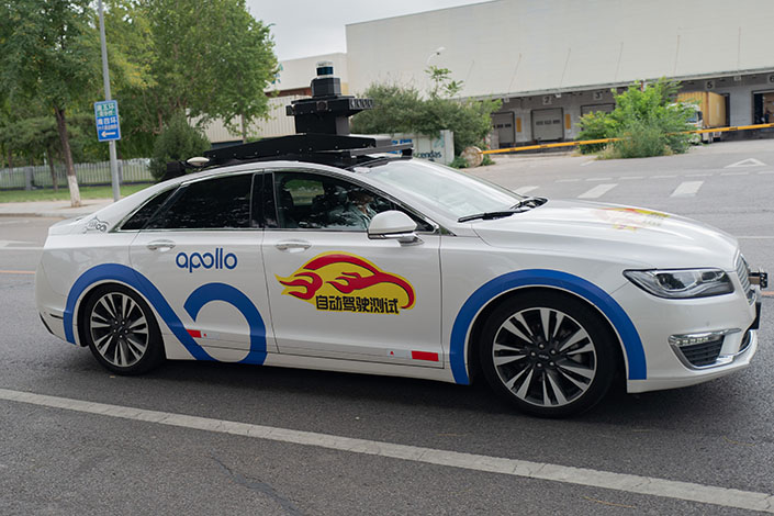 One of Baidu’s Apollo Go robotaxis drives down a road in Beijing in September 2020. Photo: IC Photo