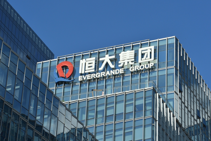 In recent months, Evergrande has been struggling to offload assets to raise cash to pay down debt. Photo: VCG