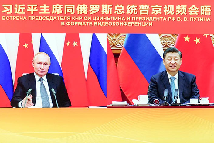 President Xi Jinping holds a video meeting with his Russian counterpart Vladimir Putin on Dec. 15. Photo: Xinhua