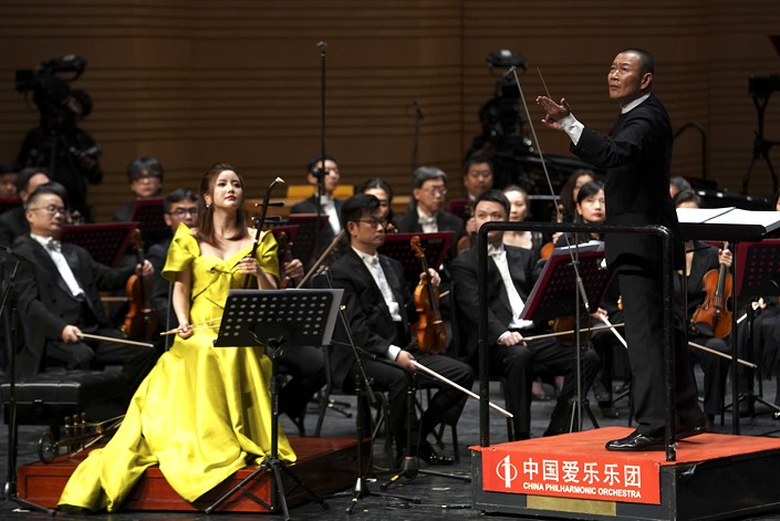 Chinese composer and conductor Tan Dun conducts the China Philharmonic Orchestra at the Poly Theater in Beijing on Oct 24. Photo: VCG