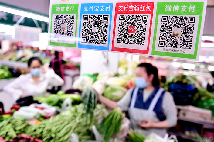 New regulations bar businesses from using barcodes generated by personal accounts on platforms like Alipay and WeChat Pay. Photo: VCG