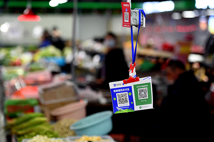 New regulations bar businesses from using barcodes generated by personal accounts on platforms like Alipay and WeChat Pay. Photo: VCG