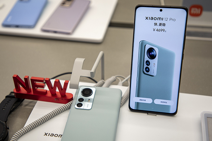 A Xiaomi 12 Pro series phone at a Xiaomi store in Shanghai on Wednesday. Photo: VCG