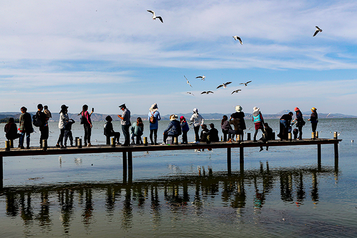 Tourists take in the sights at Nandianchi National Wetland Park in November 2019 in Kunming, Southwest China’s Yunnan province. Photo: VCG