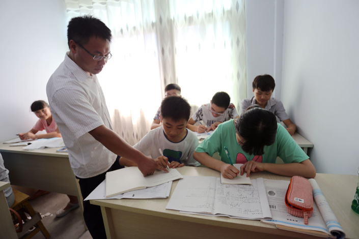 Students attend an after-school class in East China's Anhui province in 2014. Photo: VCG