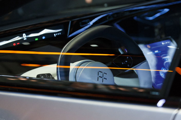 The Faraday Future logo is displayed on the steering wheel of an FF91 electric car in Las Vegas, Nevada, U.S.,in 2017. Photo: VCG