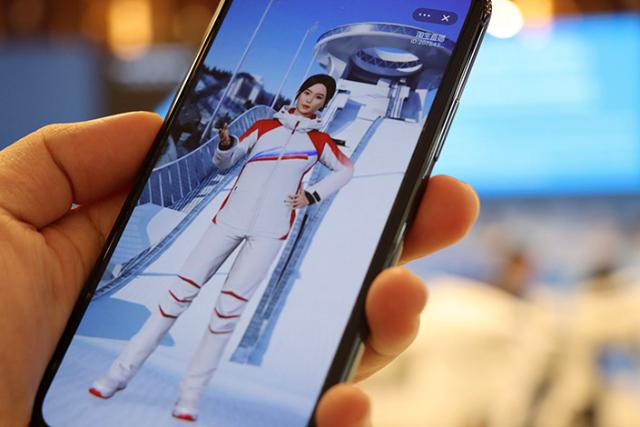 Alibaba's AI-powered virtual influencer Dong Dong engages with an audience member during the Beijing Winter Olympics. Photo: Alibaba Group
