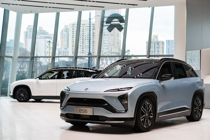 Electric-car maker Nio's vehicles on display at a store in Shanghai on Feb. 17. Photo: VCG