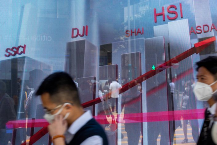 An electronic screen displays an illustrative chart in Hong Kong on March 15. Photo: Bloomberg