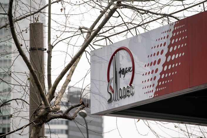 A logo atop a China Petroleum & Chemical Corp. (Sinopec) gas station in Shanghai, China, on Thursday, Jan. 7, 2021. Photo: Bloomberg