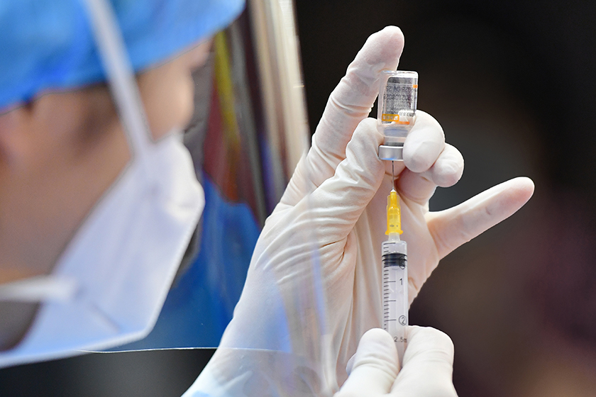 In September, China approved two Covid-19 vaccines for emergency use as heterologous boosters — vaccines that are different from the ones people use to complete their primary series of inoculations. Photo: VCG