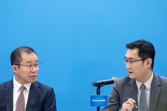 Ma Huateng, right, and Martin Lau during a news conference in 2019. Photo: Bloomberg