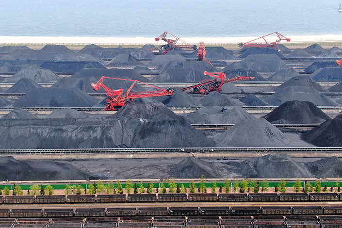 Mounds of coal cover the landscape Thursday at the port of Rizhao in East China’s Shandong province. Photo: VCG