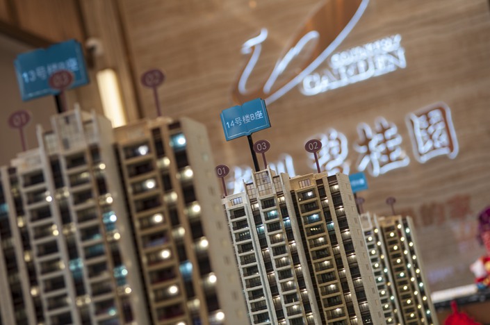 Financial regulators have allowed private property firms Country Garden, Longfor and Midea Real Estate to issue bonds backed by credit derivative contracts. Photo: VCG