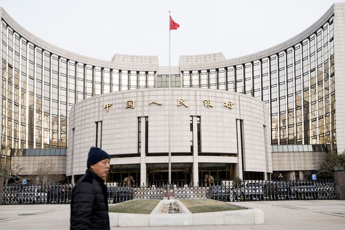 The People’s Bank of China said it will allow foreign institutions to trade bonds on its smaller exchange market