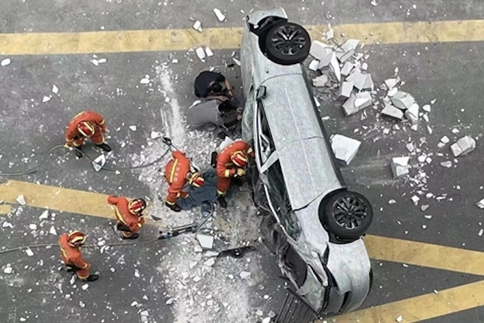 News of the incident started circulating on the internet late Wednesday with photos and video clips showing a grey Nio vehicle lying on its side surrounded by broken glass and other debris